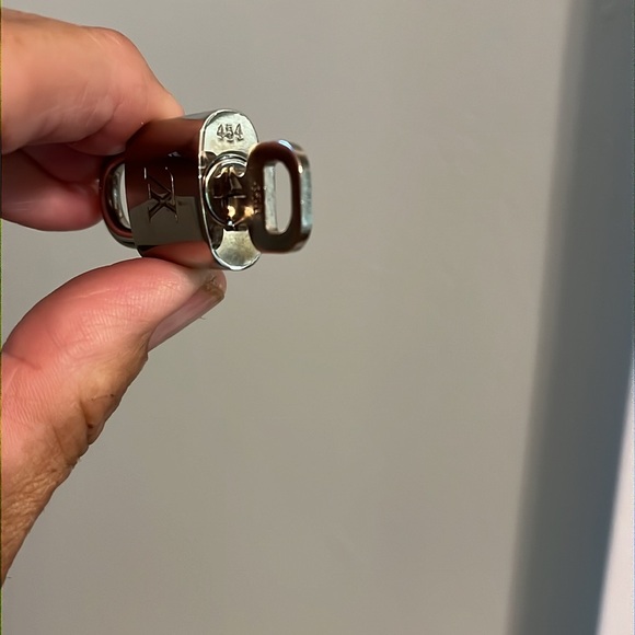 Silver LV PadLock & key. # 454. Comes with LV pouch & 18” Silver Chain - Picture 4 of 6